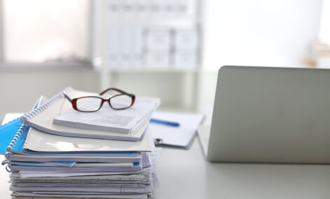 AdobeStock 284328715 (1)   paperwork and laptop